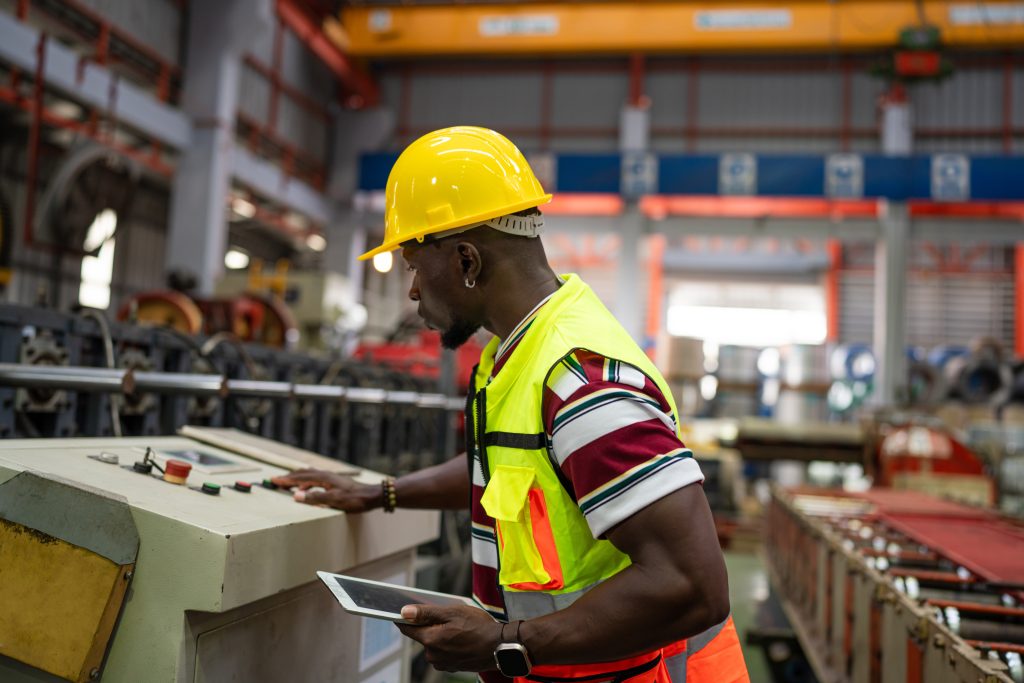 Engineer operating machine with mobile device